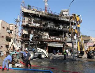 Bomb blasts in Iraq kill 49: police, medics