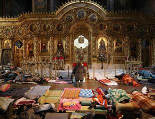 Ukraine leader denounces coup bid, West weighs sanctions