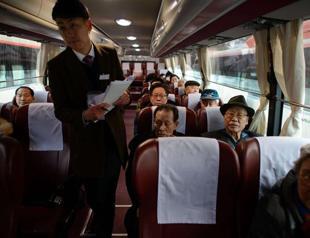 Divided Koreans hold bitter-sweet family reunion