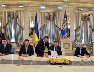 Ukraine leader, opposition reach deal to end crisis