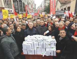 Opposition throws fake money in Taksim during rally over tape incriminating Turkish PM