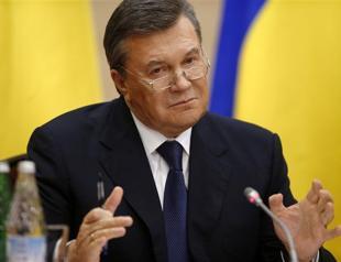 Yanukovych insists not overthrown, will fight on