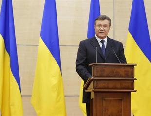 Yanukovych says still president, expects return to Kiev