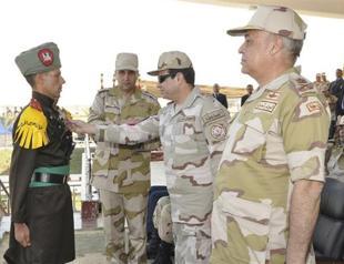 Egypt orders 18 Brotherhood members held on terror charges: media