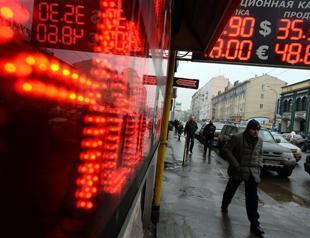 Russian central bank hikes rates as ruble plunges over Ukraine crisis