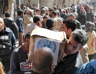 Fighting in Damascus district halt aid to Palestinians: UN