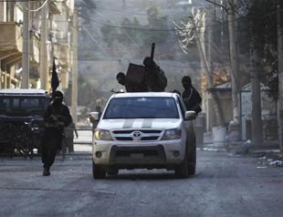 Islamist rebels fight to take Syria crossing with Turkey