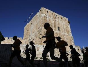 Palestinians protest Jerusalem marathon