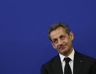 Frances Hollande, Sarkozy spar over Stasi wiretapping