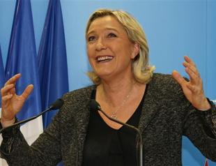 French far-right triumphs in local polls that hammer ruling Socialists