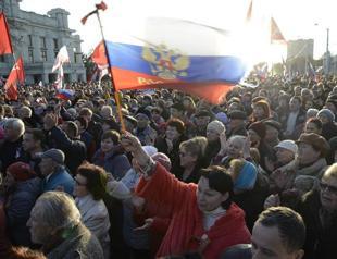 NATO announces review of cooperation with Russia as EU freezes assets of ousted leader