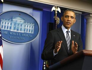 Obama warns Putin on Crimea, orders sanctions over Russian moves in Ukraine