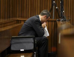 Pistorius vomits in court as girlfriends autopsy detailed