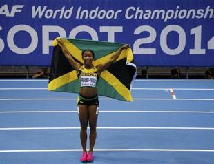 Fraser-Pryce wins, US men set relay record