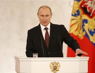 Putin, Crimea leaders sign treaty on Crimea joining Russia