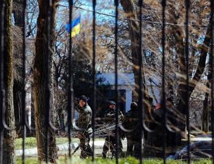 Ukraine suffers first casualty in Crimea as PM says conflict enters military stage