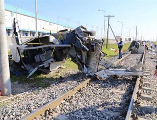 Ten killed as commuter train crashes into shuttle bus in southern Turkey