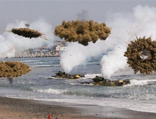 North, South Korea trade live fire over sea border