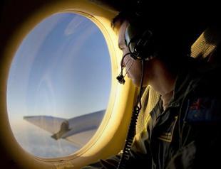 No clues in MH370 cockpit transcript as search wears on