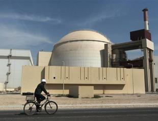 Iran curbs enrichment as nuclear deal takes effect