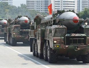 North Korea test-fires missiles as Obama hosts summit