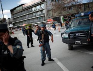 Suicide bomber kills 6 police at Afghan ministry ahead of vote