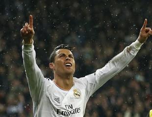 Ronaldo equals record as Real and PSG win