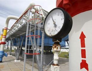 Russia hikes gas prices for Ukraine, squeezes fragile economy