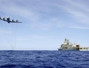 Malaysia says no mid-flight phone call from MH370 cockpit