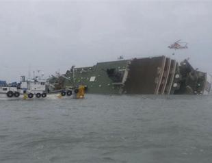 Fears grow for hundreds missing in South Korean ferry capsize as nine confirmed dead