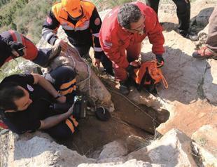 Rescue continues for man stuck in a cave