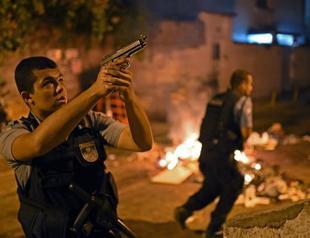 One dead as violent protests erupt in Rio