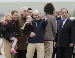 From Turkey-Syria border, to Paris: French journalists arrive home after hostage ordeal