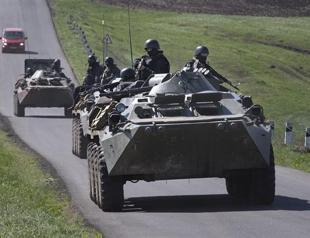 G7 agrees sanctions on Russia, as Ukraine rebels detain OSCE team