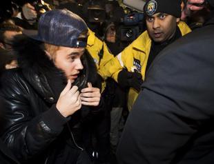 Police charge Justin Bieber with assault