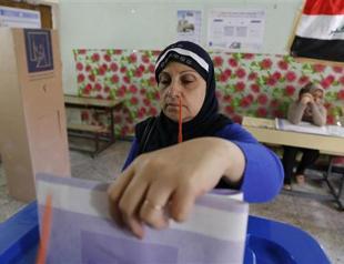 Iraqis vote on Wednesday as blast at polling centre kills two women
