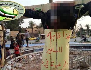 ISIL crucifies prisoners, bulldozes historic statue