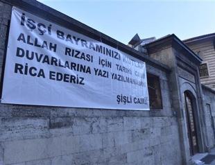 Istanbul mosque asks May Day protesters not to damage its walls with writings