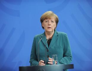 Merkel asked Putin to help free OSCE in Ukraine: Kremlin