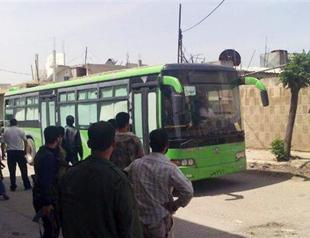 Last rebel convoy poised to leave Syrias Homs: governor