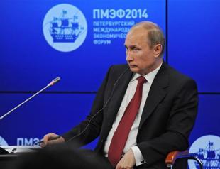 Putin vows to respect Ukraine vote but warns of civil war