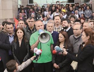 Prosecutors seek the arrest of four in May Day detentions