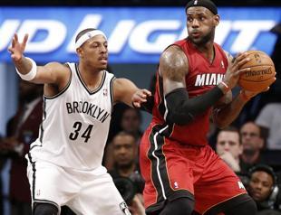 James lifts Heat in win over Nets