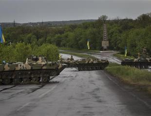 Ukraine hosts roundtable talks after bloody day for military