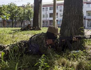 Ukraine rebels down army helicopter, killing 12 troops