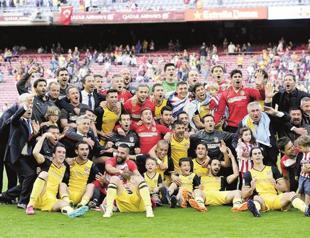 Draw against Barça takes Atletico to La Liga title