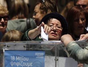 Close race in Greek local elections between leftists, government