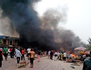 Twin Nigeria car bombs kill at least 118