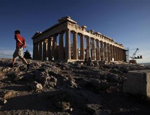 Greeks hope for a bumper season as the tourists come back