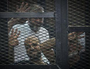 Egypt court sentences 12 Morsi supporters to death